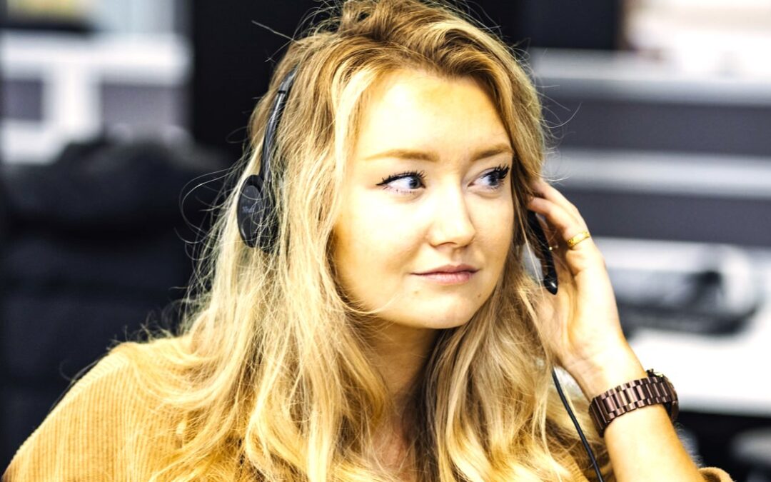 Woman in call centre on the telephone