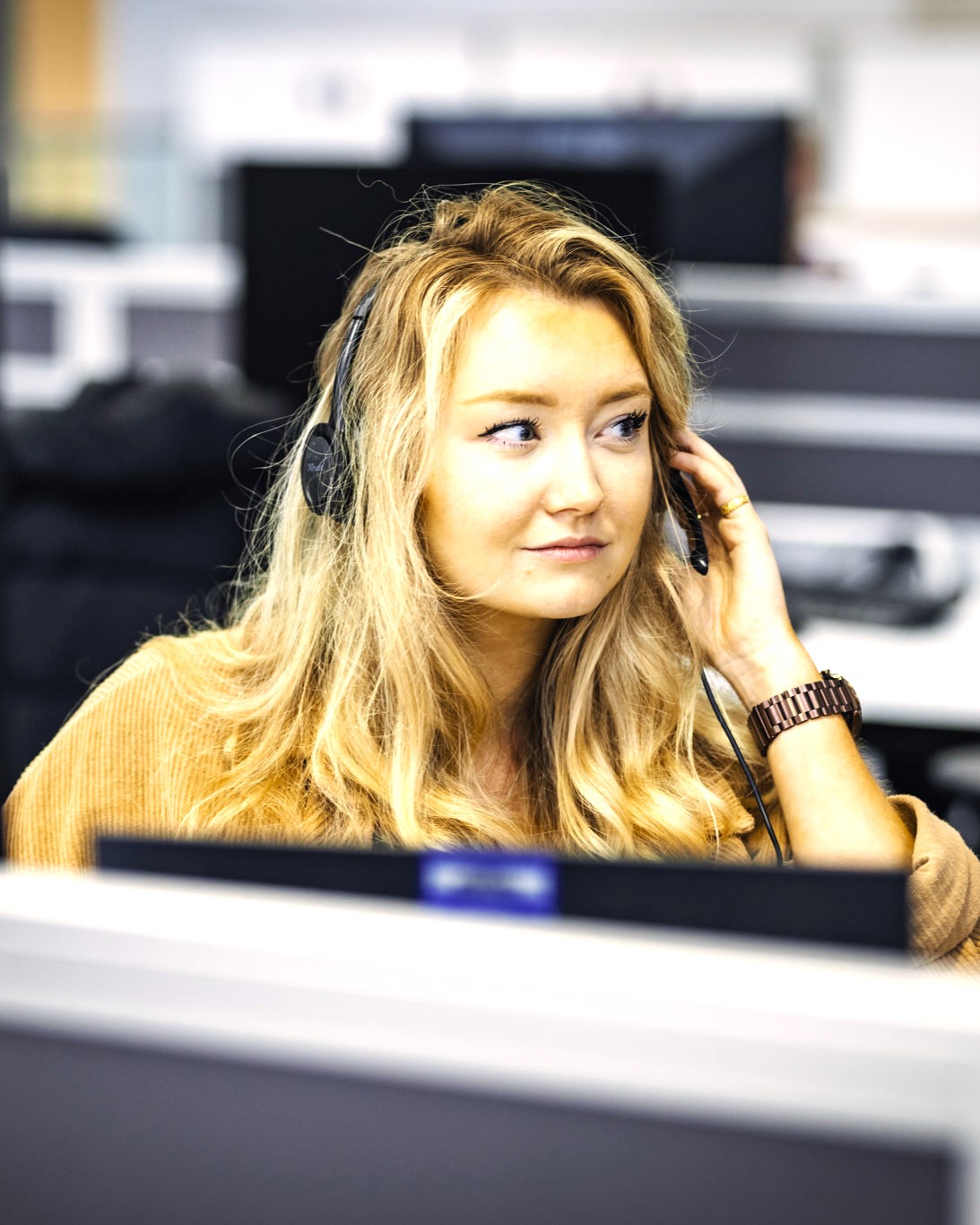 Woman in call centre on the telephone