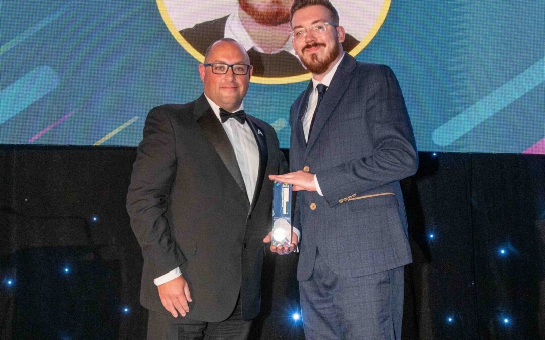 left: Thomas Burton, Head of Apprenticeship Delivery at York St John University presents Kieran Graham with the Technology and Digital Apprentice of the Year award.