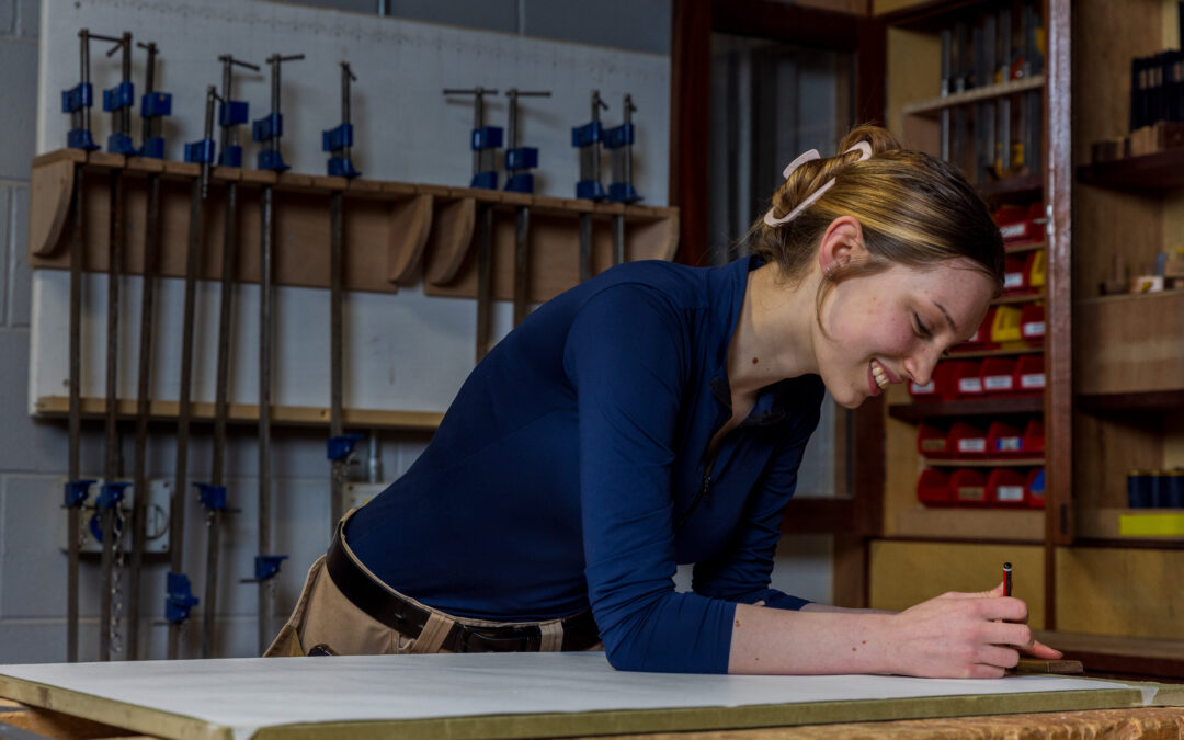 A student taking part in a joinery class